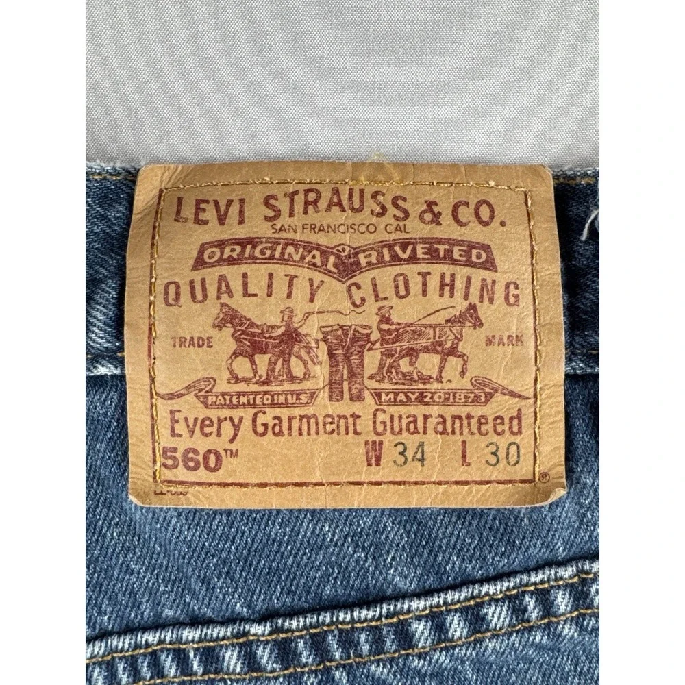 Vintage Levi's 560 Loose Tapered Jeans 34x30 Medium Wash Made In USA